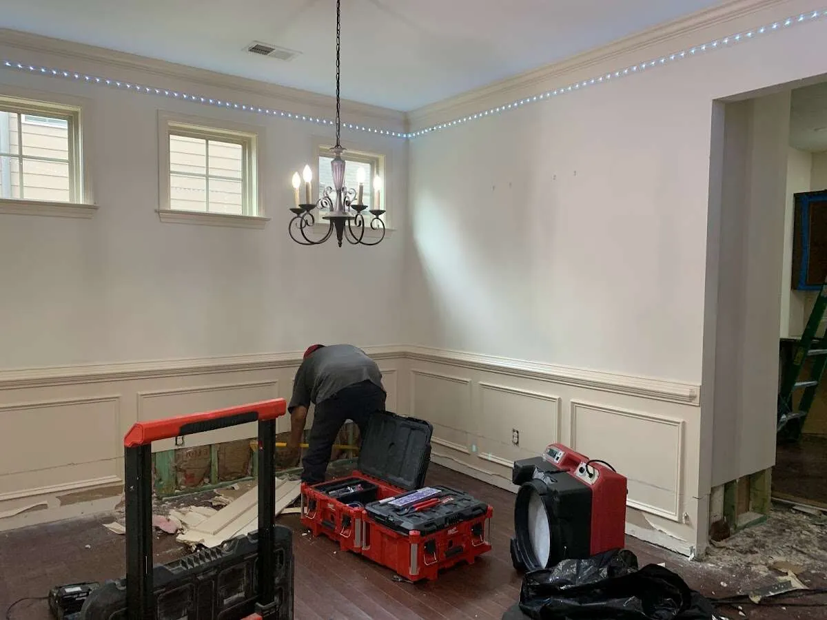 Restoration technician with professional equipment in South Windsor